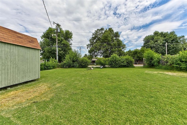5417 NW 45th Ter, Warr Acres, OK 73122 - view of grassy yard with an outdoor structure