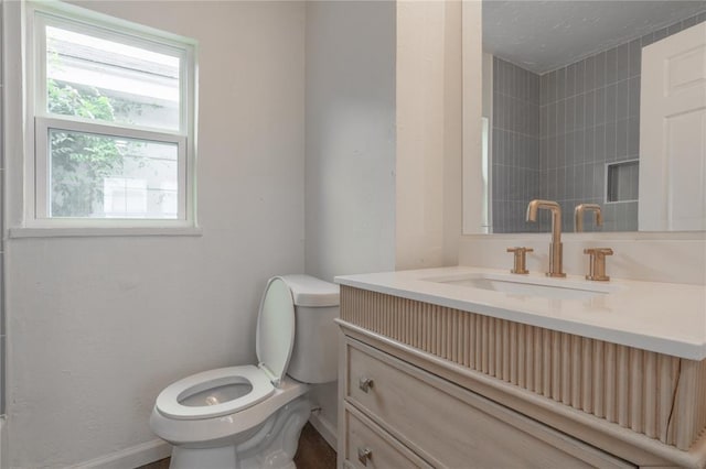 2220 SW 28th St, Oklahoma City, OK 73108 - bathroom featuring vanity and a textured ceiling