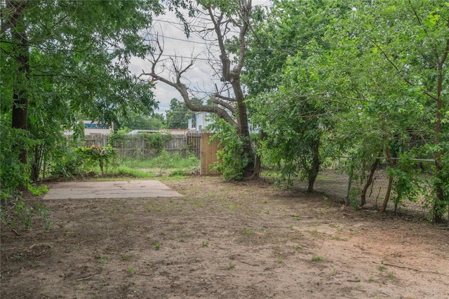 2220 SW 28th St, Oklahoma City, OK 73108 - view of yard with a patio