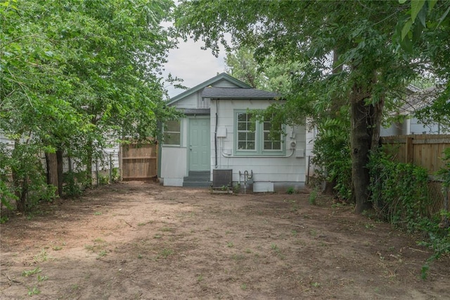 2220 SW 28th St, Oklahoma City, OK 73108 - rear view of house featuring entry steps
