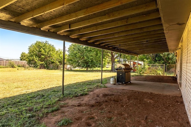 2120 E Robberts Ave, Kingfisher, OK 73750 - fenced backyard with a patio area