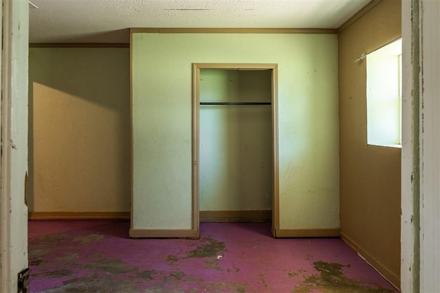 2120 E Robberts Ave, Kingfisher, OK 73750 - unfurnished bedroom featuring baseboards and a closet
