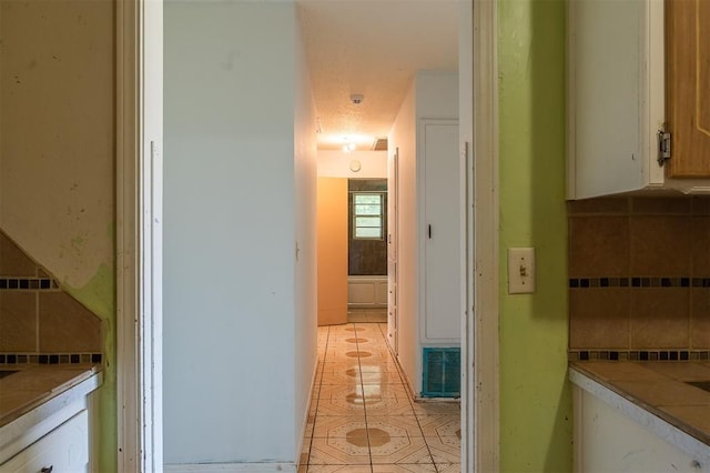 2120 E Robberts Ave, Kingfisher, OK 73750 - corridor with light tile patterned floors