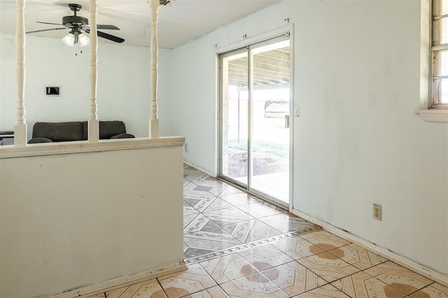 2120 E Robberts Ave, Kingfisher, OK 73750 - empty room featuring a ceiling fan, light tile patterned floors, and inlaid floor details