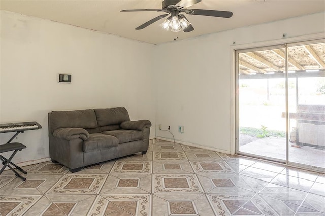 2120 E Robberts Ave, Kingfisher, OK 73750 - living area with plenty of natural light, light tile patterned floors, and ceiling fan