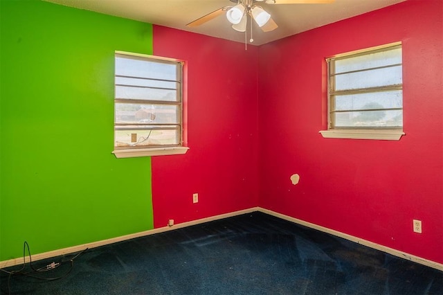 2120 E Robberts Ave, Kingfisher, OK 73750 - carpeted empty room with ceiling fan and baseboards