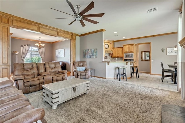 1716 NW 182nd St, Edmond, OK 73012 - living area with crown molding, a ceiling fan, a chandelier, light colored carpet, and light tile patterned floors