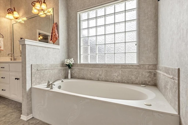 1716 NW 182nd St, Edmond, OK 73012 - bathroom featuring plenty of natural light, vanity, a bath, and tile patterned flooring