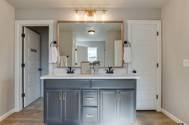 6420 SE 88th St, Oklahoma City, OK 73135 - bathroom featuring double vanity and baseboards