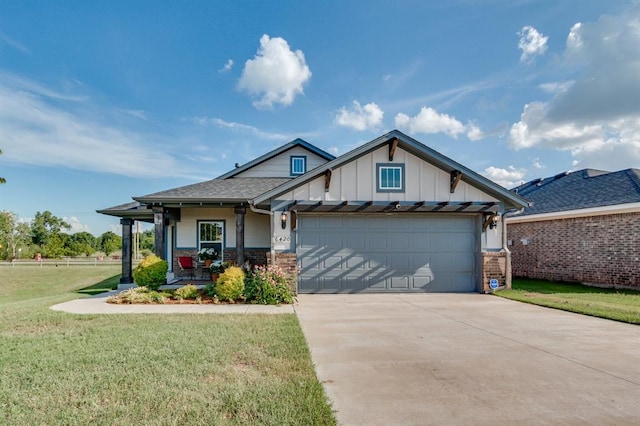 6420 SE 88th St, Oklahoma City, OK 73135 - view of front of property with a front lawn, driveway, board and batten siding, a garage, and a porch