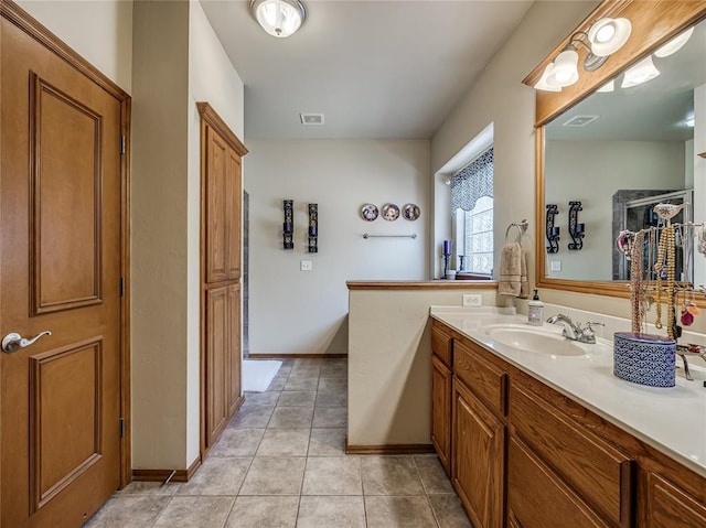 9021 NW 81st St, Yukon, OK 73099 - bathroom featuring vanity and tile patterned flooring