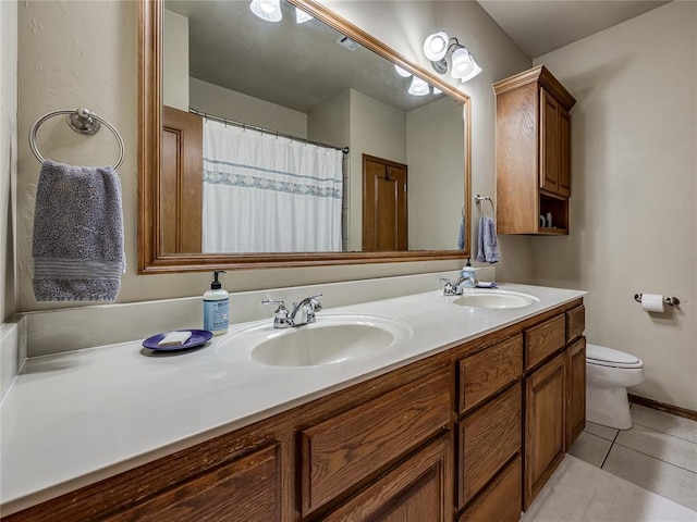 9021 NW 81st St, Yukon, OK 73099 - full bathroom with double vanity and tile patterned floors
