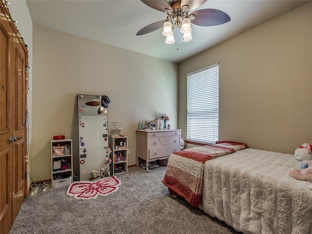 9021 NW 81st St, Yukon, OK 73099 - carpeted bedroom featuring ceiling fan
