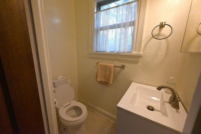 1712 W University Ave, Stillwater, OK 74074 - bathroom featuring vanity and tile patterned floors