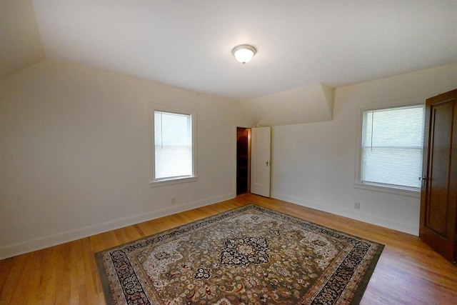 1712 W University Ave, Stillwater, OK 74074 - spare room featuring light wood-style floors and baseboards