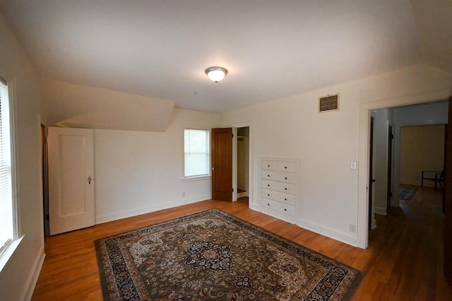1712 W University Ave, Stillwater, OK 74074 - bedroom with wood finished floors and baseboards
