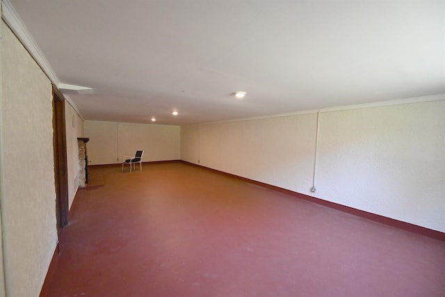 1712 W University Ave, Stillwater, OK 74074 - finished basement featuring ornamental molding and recessed lighting