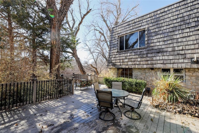2202 NW 45th St, Oklahoma City, OK 73112 - wooden terrace with outdoor dining space