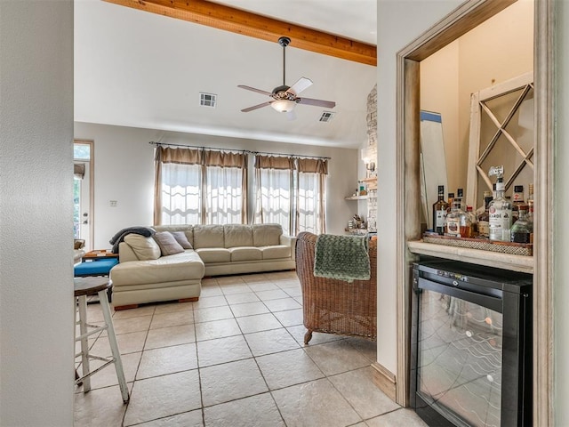 56201 E 285th Rd Unit F36, Afton, OK 74331 - living area featuring wine cooler, a ceiling fan, light tile patterned flooring, and a dry bar
