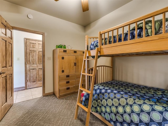 56201 E 285th Rd Unit F36, Afton, OK 74331 - carpeted bedroom featuring tile patterned floors