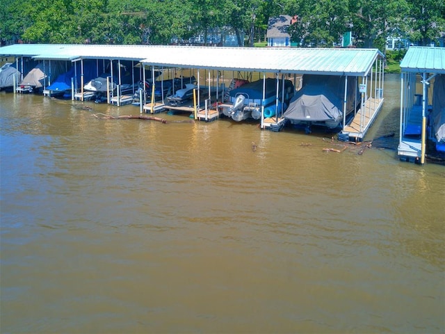 56201 E 285th Rd Unit F36, Afton, OK 74331 - dock featuring boat lift and a water view