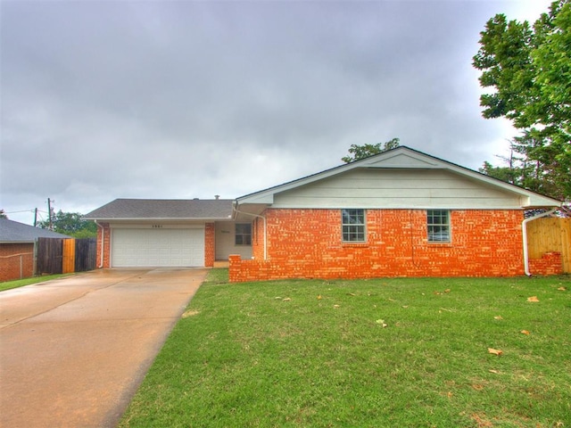 5901 Seminole Rd, Warr Acres, OK 73132 - ranch-style home with an attached garage, driveway, and brick siding