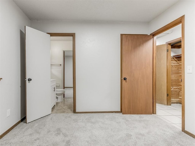 5901 Seminole Rd, Warr Acres, OK 73132 - unfurnished bedroom with carpet flooring and connected bathroom