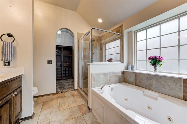 921 Tea Rose Dr, Yukon, OK 73099 - bathroom featuring a shower stall, a whirlpool tub, lofted ceiling, and vanity