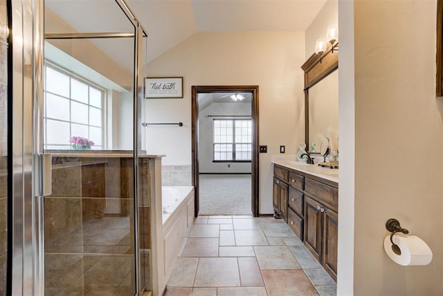 921 Tea Rose Dr, Yukon, OK 73099 - full bathroom with double vanity, a bath, a shower stall, and lofted ceiling