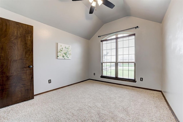 921 Tea Rose Dr, Yukon, OK 73099 - spare room featuring a ceiling fan, carpet floors, and lofted ceiling