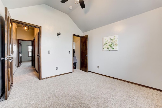 921 Tea Rose Dr, Yukon, OK 73099 - unfurnished bedroom with vaulted ceiling, light colored carpet, and ceiling fan