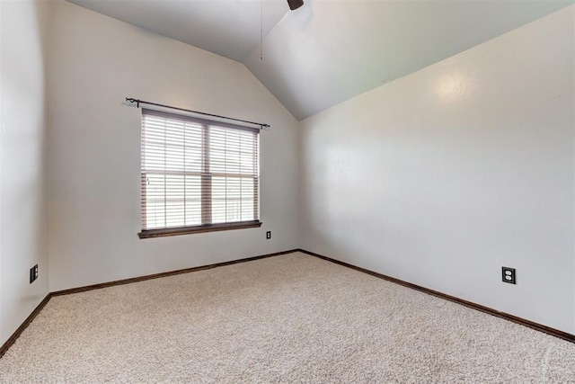 921 Tea Rose Dr, Yukon, OK 73099 - empty room featuring carpet, vaulted ceiling, and ceiling fan
