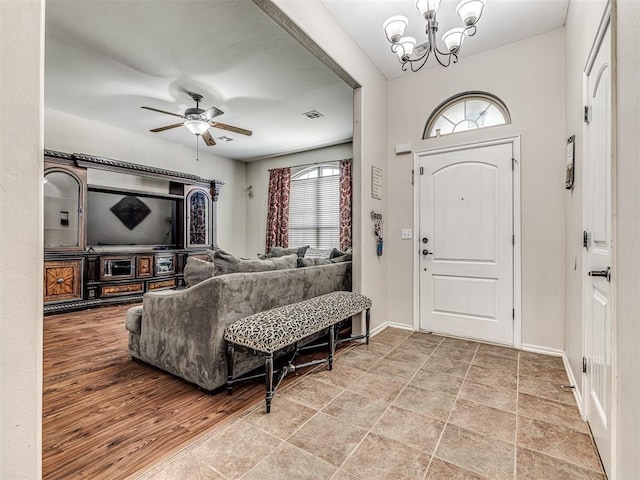 516 SW 161st St, Oklahoma City, OK 73170 - entrance foyer with a chandelier and ceiling fan