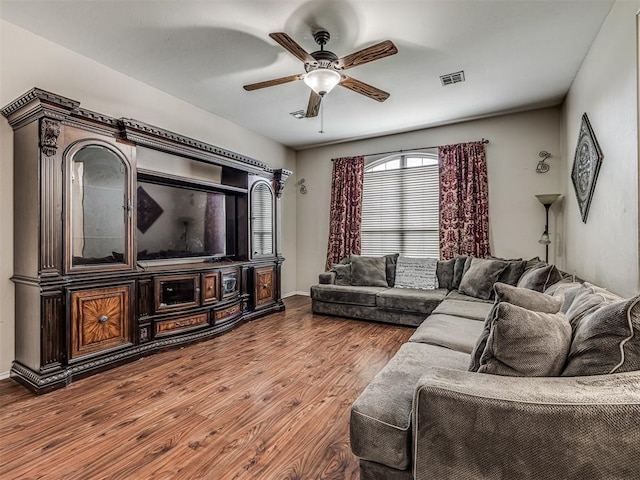 516 SW 161st St, Oklahoma City, OK 73170 - living area featuring wood finished floors and a ceiling fan