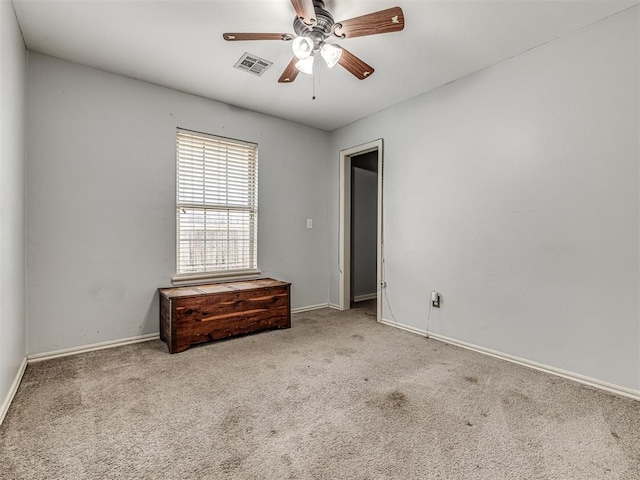 516 SW 161st St, Oklahoma City, OK 73170 - carpeted spare room featuring baseboards and ceiling fan