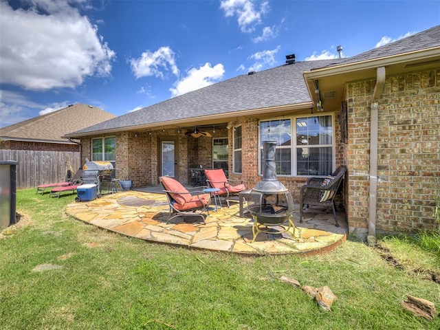 516 SW 161st St, Oklahoma City, OK 73170 - view of patio featuring an outdoor fire pit, ceiling fan, and grilling area