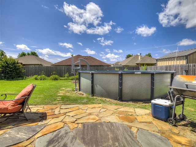 516 SW 161st St, Oklahoma City, OK 73170 - fenced backyard with a patio area