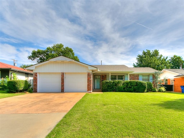 1917 Barryton Rd, Oklahoma City, OK 73120 - single story home featuring an attached garage, brick siding, driveway, and a front lawn