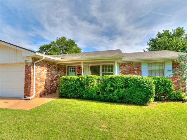 1917 Barryton Rd, Oklahoma City, OK 73120 - ranch-style house with brick siding, a garage, a front lawn, and roof with shingles