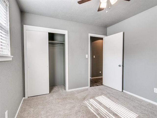 1917 Barryton Rd, Oklahoma City, OK 73120 - unfurnished bedroom with carpet floors, a closet, a textured ceiling, and ceiling fan