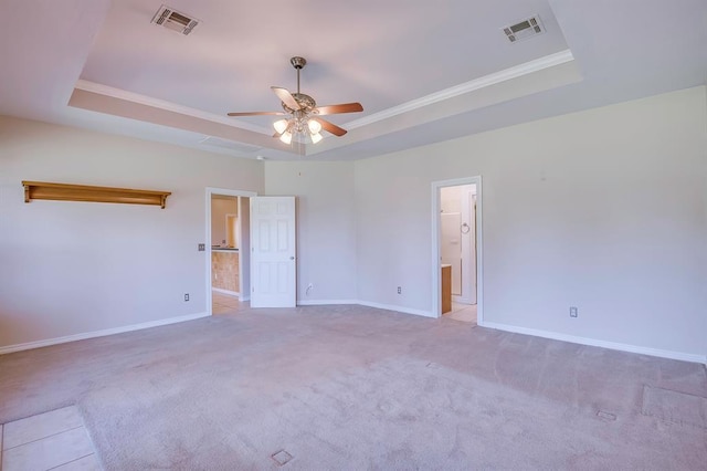 4621 Deer Ridge Blvd, Yukon, OK 73099 - carpeted empty room with a raised ceiling, ceiling fan, and crown molding