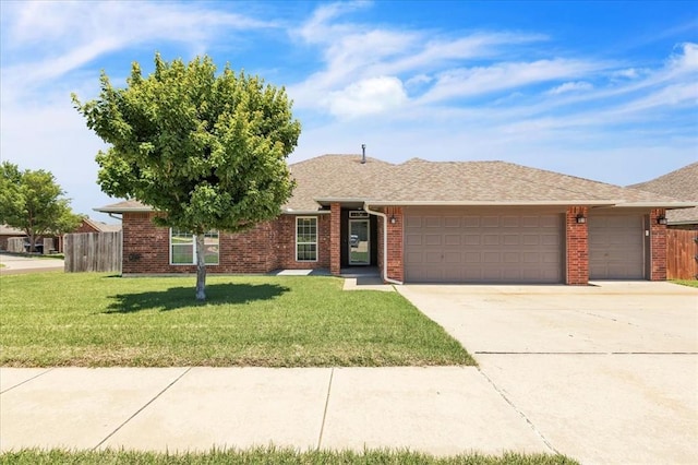 11321 NW 103rd St, Yukon, OK 73099 - ranch-style house with an attached garage, concrete driveway, brick siding, and a shingled roof