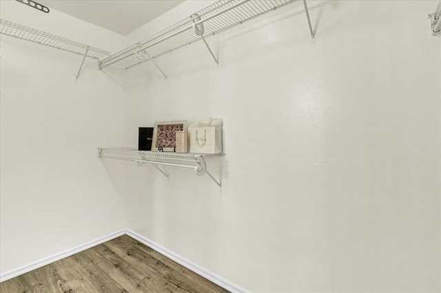 11321 NW 103rd St, Yukon, OK 73099 - spacious closet with wood finished floors