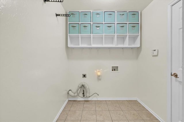 11321 NW 103rd St, Yukon, OK 73099 - laundry area with electric dryer hookup, hookup for a gas dryer, washer hookup, and light tile patterned flooring