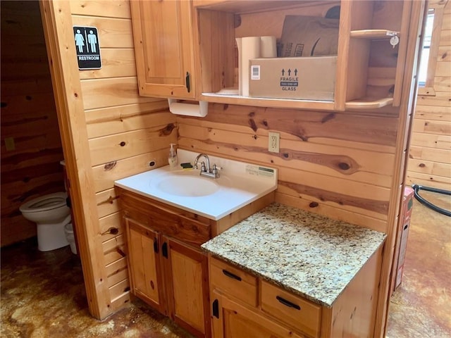 50 Spearfish Rd, Broken Bow, OK 74728 - bathroom with vanity and wood walls