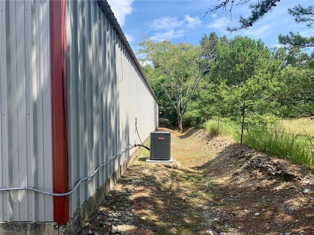 50 Spearfish Rd, Broken Bow, OK 74728 - view of property exterior featuring a cooling unit
