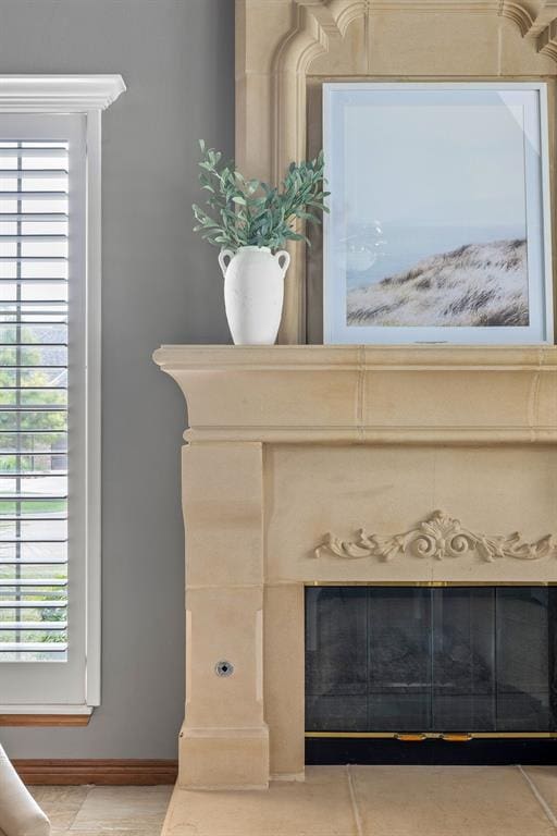 4719 W Two Lakes Ave, Norman, OK 73072 - detailed view of a premium fireplace and baseboards