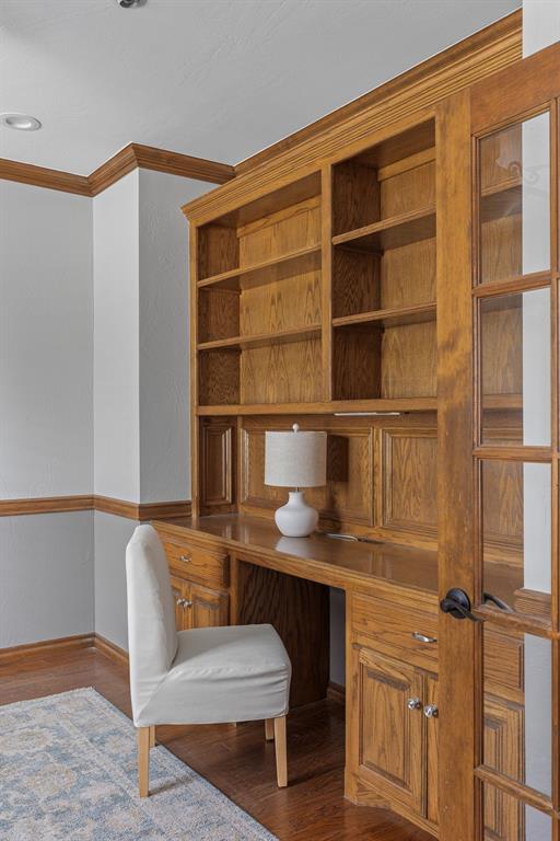4719 W Two Lakes Ave, Norman, OK 73072 - home office featuring ornamental molding and dark wood-type flooring