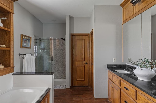 4719 W Two Lakes Ave, Norman, OK 73072 - full bathroom with a shower stall, wood finished floors, vanity, and a bath