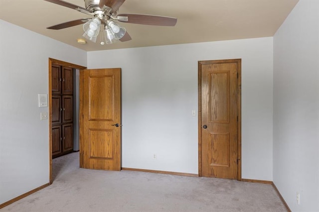 4719 W Two Lakes Ave, Norman, OK 73072 - unfurnished bedroom featuring light colored carpet and a ceiling fan
